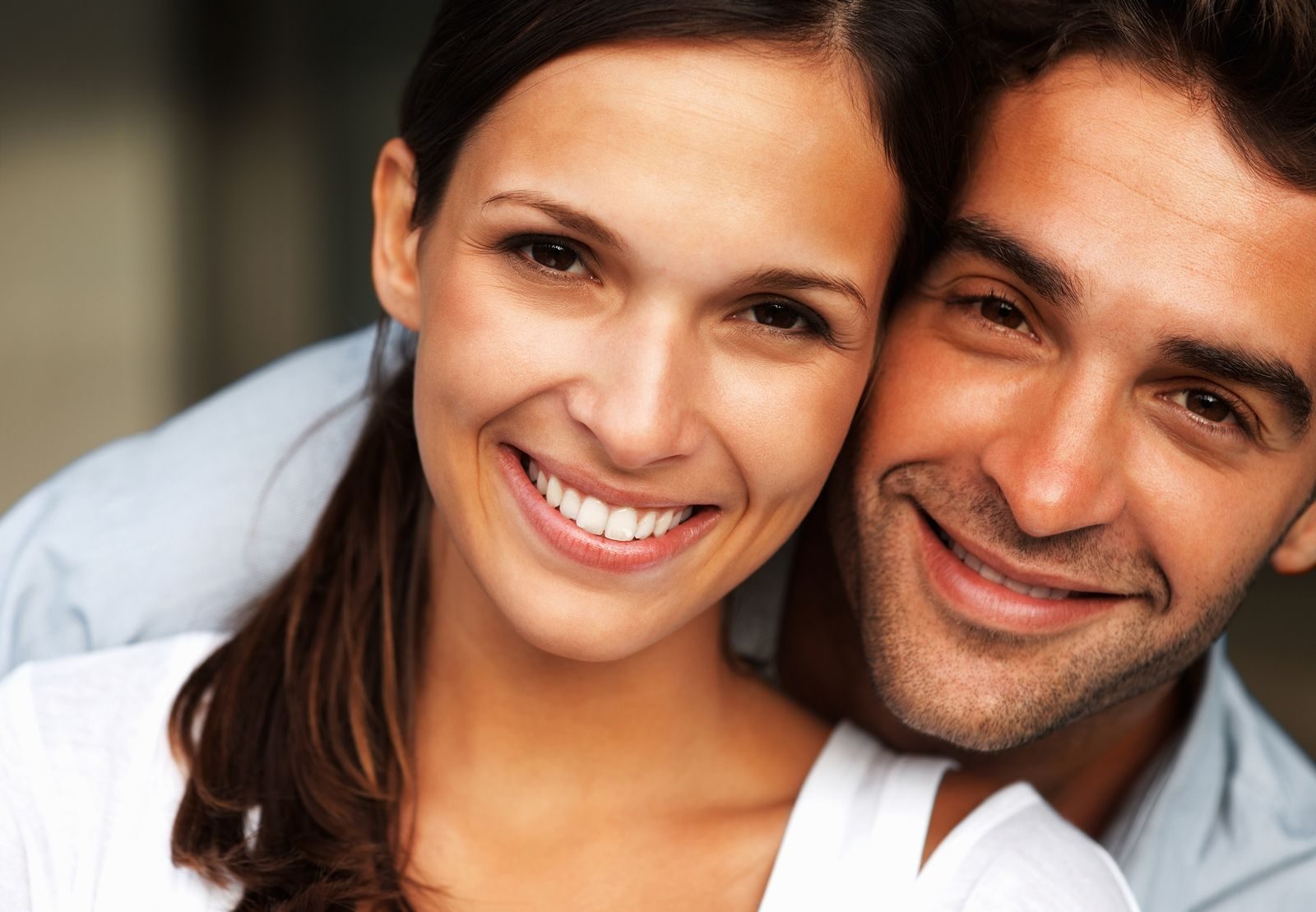 Smiling couple close together